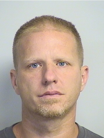 mugshot of Holcomb