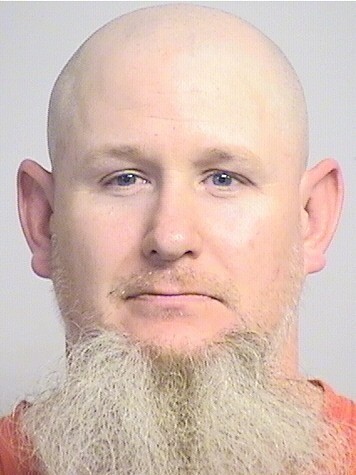 mugshot of Johnston