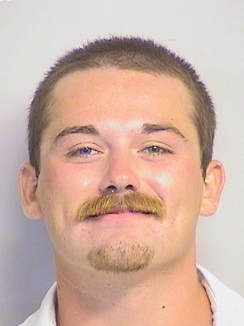 mugshot of Colbert